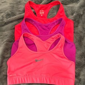 Set of 3 Nike Pro Dri-fit sports bras. Size medium.